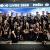 Dhiego Rosa (ao centro com o troféu em mãos) e a equipe do Grupo Escalada comemorando o prêmio de Melhor Consultoria Oficial do Mercado Livre, entregue no Mercado Livre Experience, em São Paulo, em setembro de 2026.